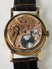 Load image into Gallery viewer, VINTAGE OMEGA TIFFANY &amp; CO 14K YELLOW GOLD MENS WRISTWATCH, C1954
